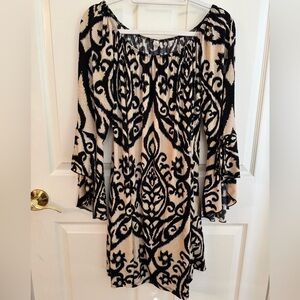 Set of two swing dresses in black and tan pattern
